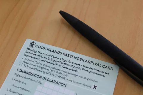 Picture of arrival card and pen